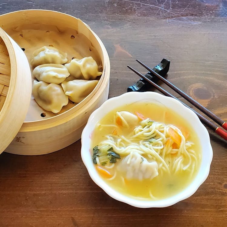 Chicken noodle dumpling soup image