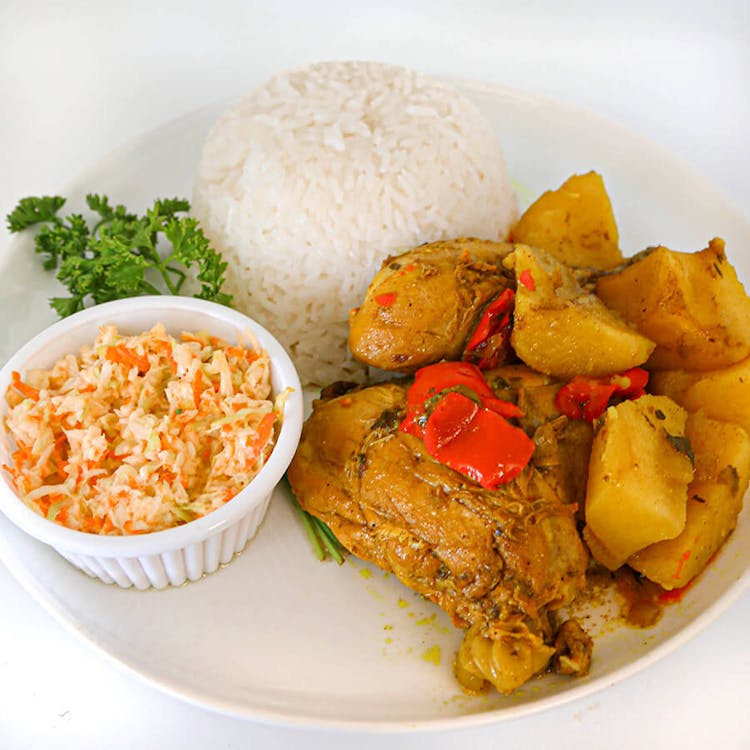 Curried Chicken + Potatoes with Rice and Slaw image