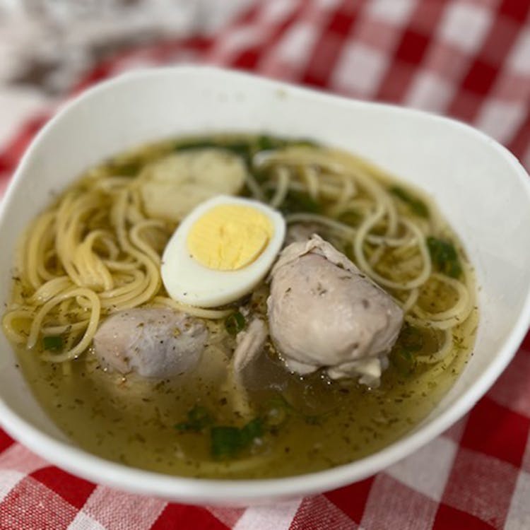 Chicken Soup w/noodles and Hard Boiled Egg image