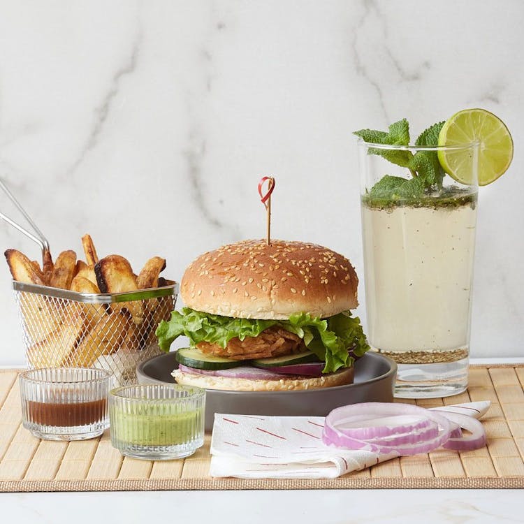Veggie Burger + Potato Wedges +Drink image
