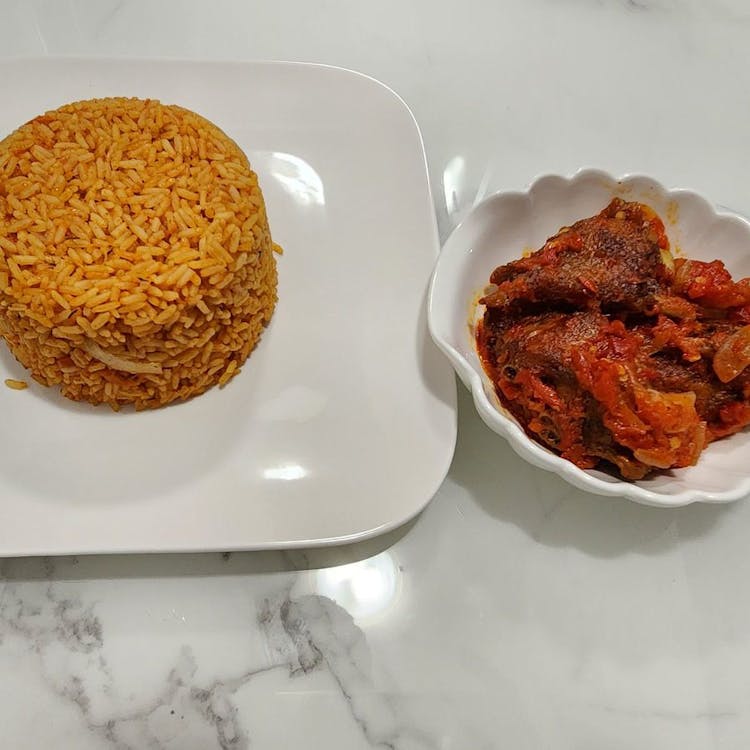 Party Jollof Rice with Peppered Chicken  image