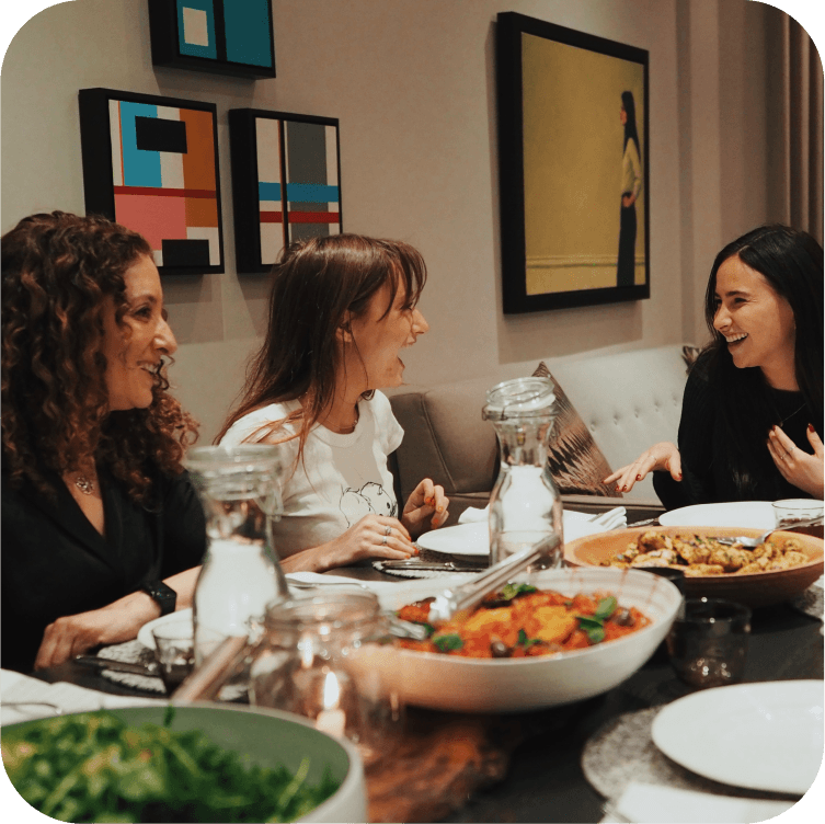 People sitting around a dinner table